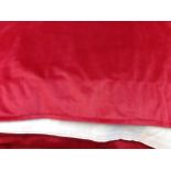 A very large single red plush velveteen curtain, 18.2mW x 2mD, suitable for a theatrical/ village