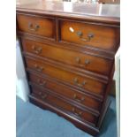 A modern mahogany chest of two short and four long drawers on a plinth base Location: RAF