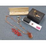 A quantity of costume jewellery to include two Scottish hardstone brooches and an agate necklace