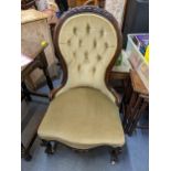 A Victorian spoon back salon chair having a serpentine front and cabriole legs Location: