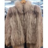 A late 20th Century arctic rabbit coat with arctic wolf collar, 34" chest x 23" long. Location:Rail3