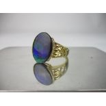 A D'Yack 14k yellow gold and oval opal doublet ring, with beaded and pierced heart decoration to the