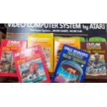 A retro Atari video computer system in original box together with six boxed games to include Space