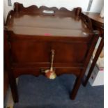 A Georgian mahogany tray topped bedside unit with pull out drawer on additional legs below two