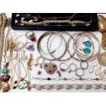 mixed costume jewellery, mostly silver and silver coloured items to include rings, bangles and stone