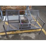 A garden aluminium two seater bench with two tier shelves to the centre, 86cm h x 143cm w.