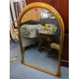 A modern gilt painted arched top wall hanging mirror, 99.5cm h x 74cm w Location: