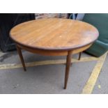 A mid 20th century G-Plan teak extending dining table, 73cm h x 122cm w, unextended Location: