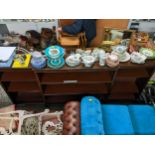 A large Edwardian mahogany breakfront bookcase, 7 adjustable shelves, on short square tapering legs,