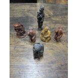 A group of Japanese wooden netsukes and other items (6) Location: