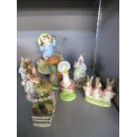A group of six Beswick and Royal Albert Beatrix Potter figurines to include Mr Jackson, a Border