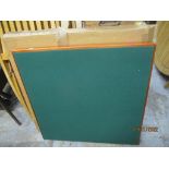 A Boxed wooden framed folding card table with green baize top Location: