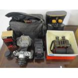 A lot of film cameras and cased binoculars to include a Minolta XG-M camera with accessories in