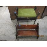 A late Victorian ebonized music stool, with green upholstered hinged seat, turned arm rests and