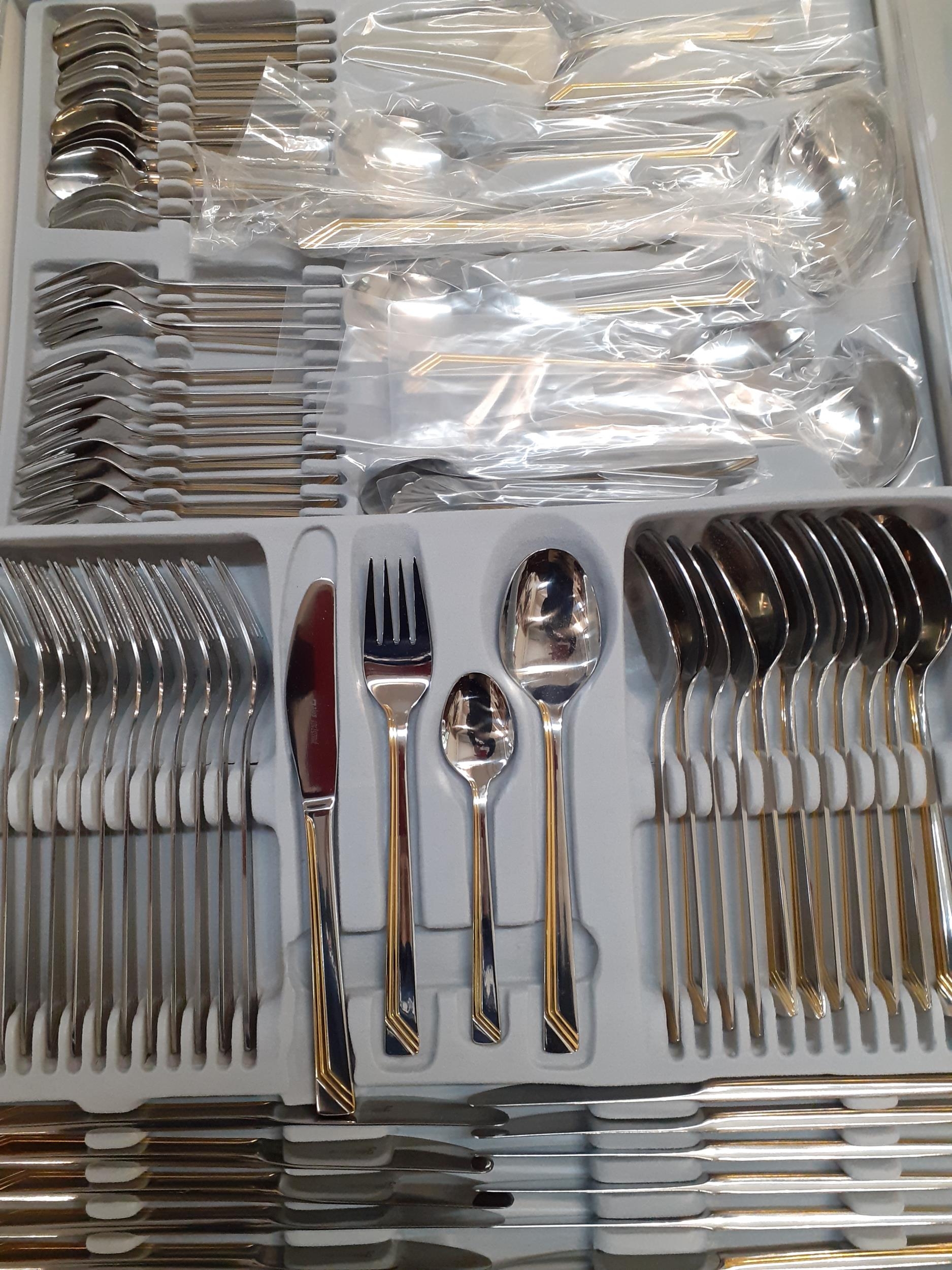 An SBS Bestecke Solingen 12-setting cutlery set in a gold and silver colour housed in a silver - Image 2 of 3