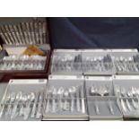 An Arthur Price silver plated 12-setting cutlery set housed in a mahogany case with 7 additional