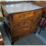 A late 17th/early 18th century oak chest of two short and three long drawers with brass drop handles