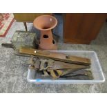 A mixed lot to include a terracotta garden forcer, a painted metal ammunition box, various saws