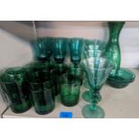 Mixed green glassware A/F to include cups, champagne and others, dishes, and a wine server Location: