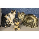 A group of three English pottery cats signed I Winstanley, the tallest 21cm Location: