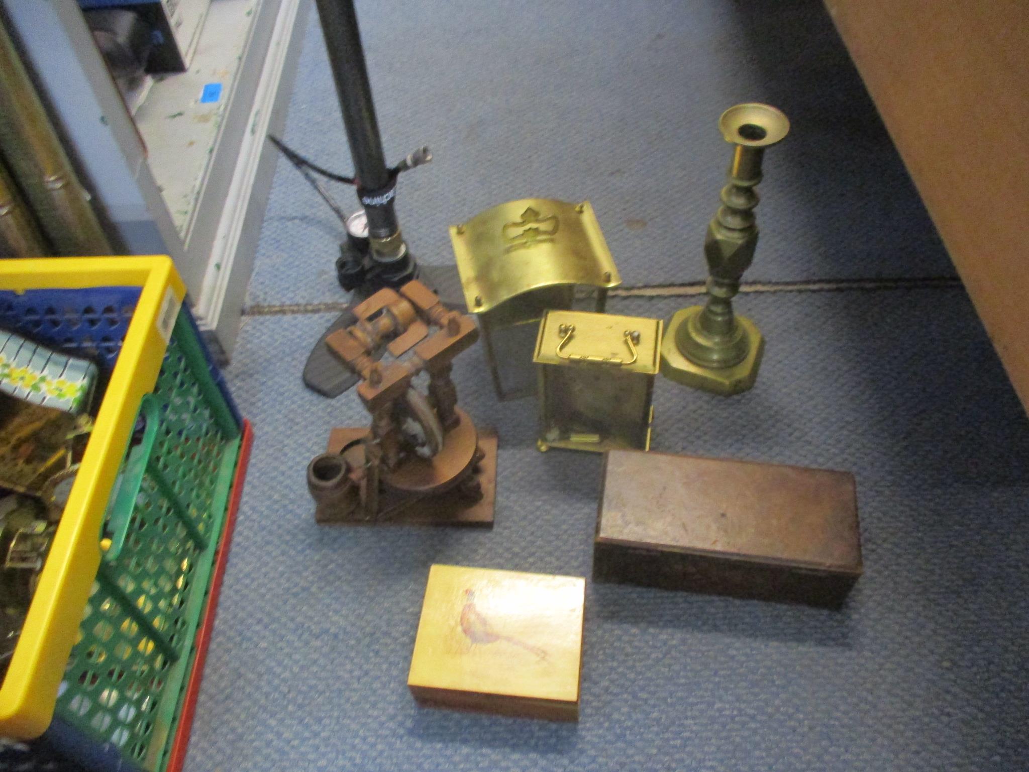 A mixed lot to include walking sticks, mantel clocks, letter rack, cameras to include a Canon A1200,
