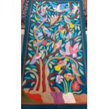 An embroidered and quilted panel of colourful songbirds amongst branches 166cm x 92cm, on a green