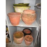 A mixed lot to include various terracotta garden planters and pot, one in a green glaze, a 19th