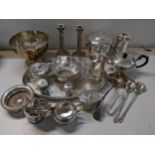 Silver plate to include a pair of candlesticks, a bowl, an ice bucket, tankards, a tray and other
