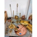 Brass and copper to include a jelly mould, toasting forks, a shoe jack, 18th century candlestick,