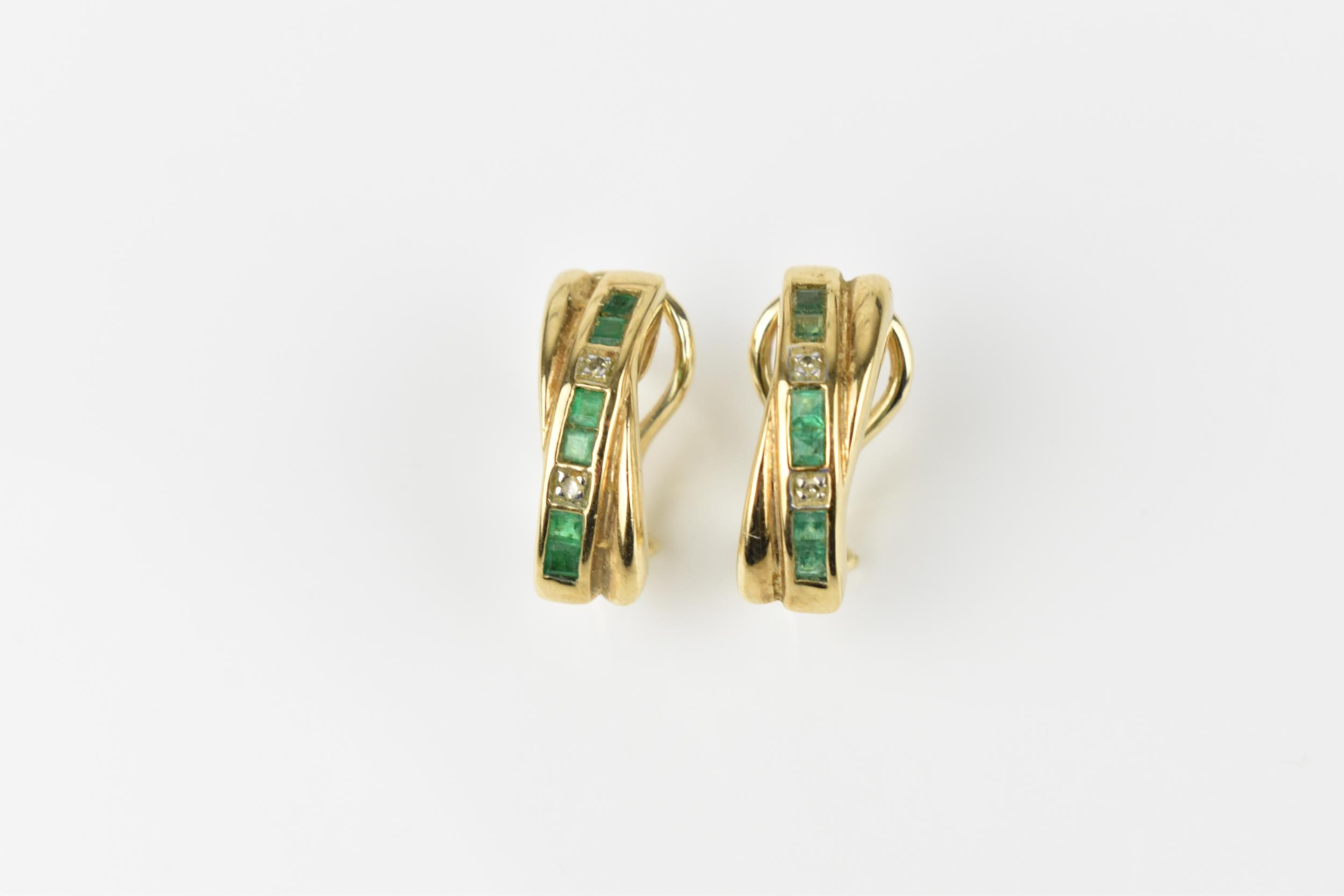 A pair of 9ct yellow gold, diamond and emerald earrings, with channel set princess cut emeralds in - Image 3 of 4