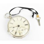 A late 19th silver open faced pocket watch having a white enamel dial, signed, with blued hands,