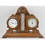 An early 20th century oak combination table clock, barometer and thermometer, having a scroll carved