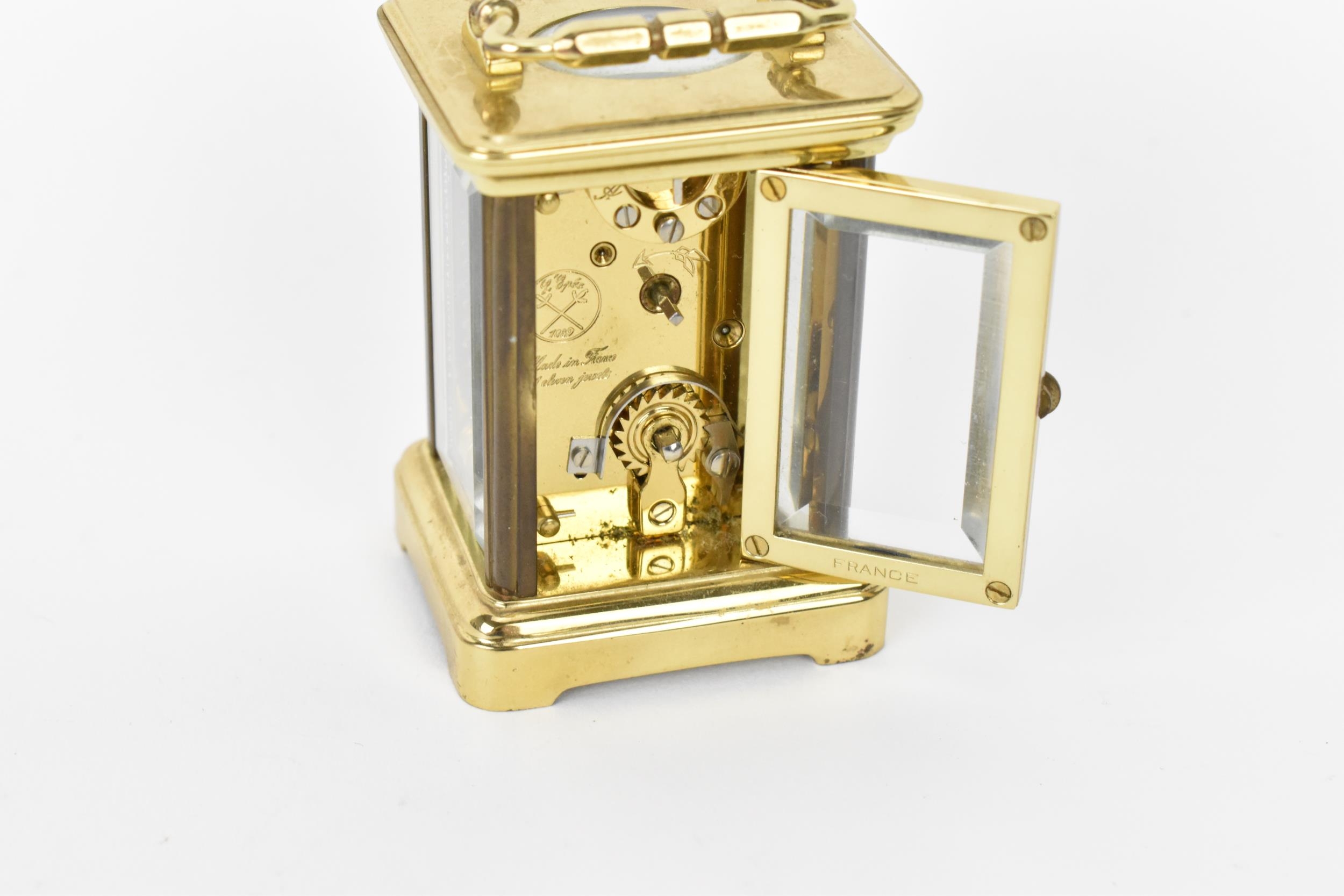 A modern L'Epee brass cased miniature carriage clock, white enamel dial with Roman numerals, the - Image 9 of 9