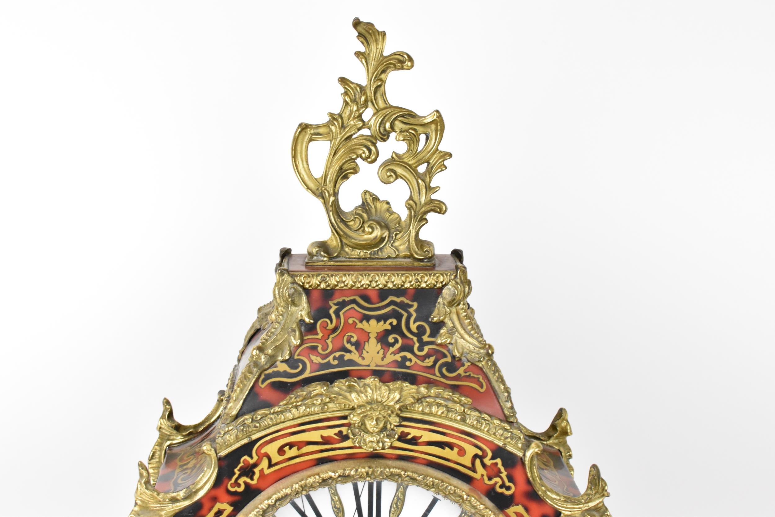 A 20th century French boulle work mantle clock having applied gilt metal C scroll and floral - Image 2 of 10