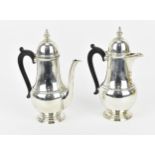A pair of George V silver hot water and coffee pot by Mappin & Webb, each of baluster form with