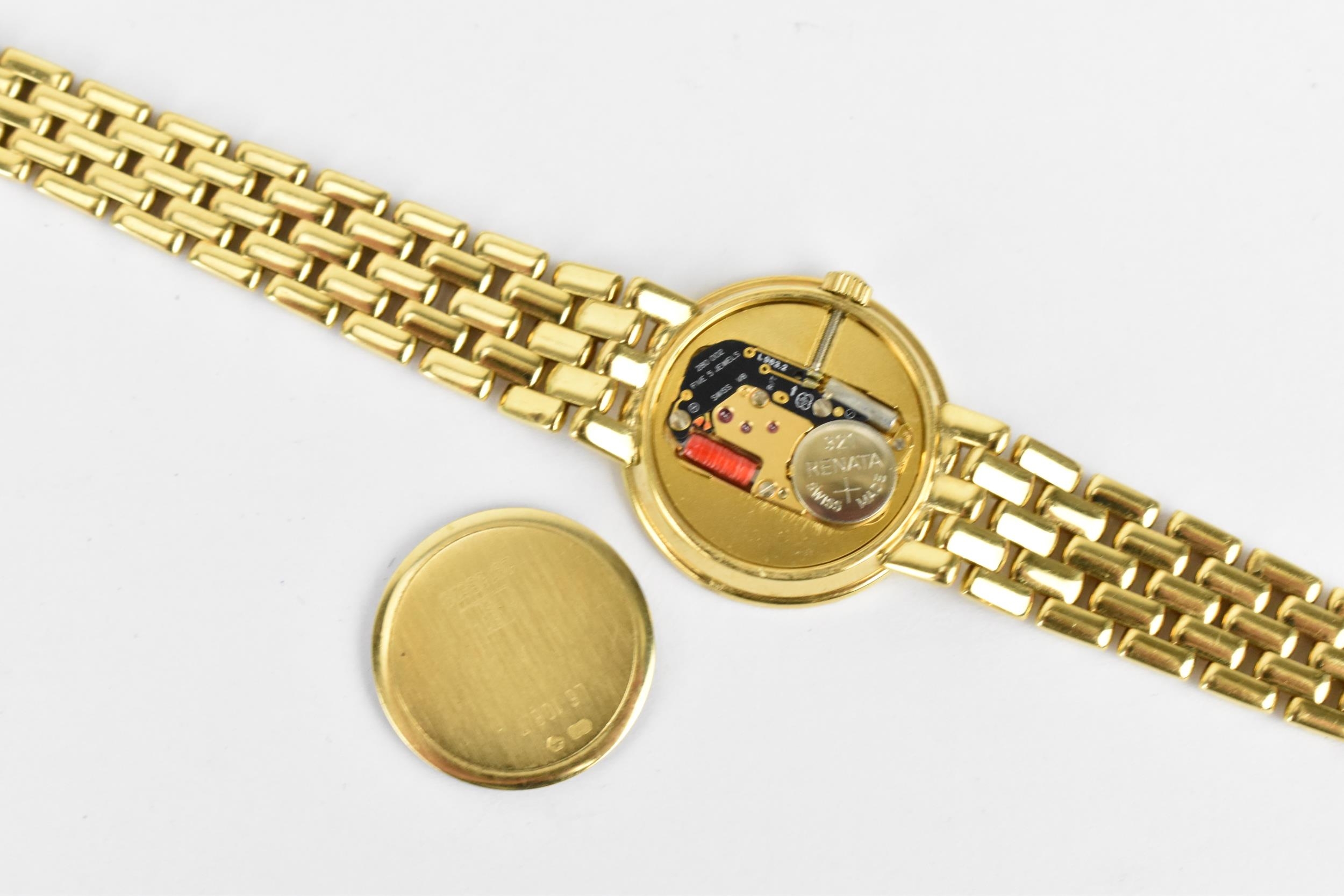 A Longines, quartz, ladies 18ct gold wristwatch having a diamond set bezel, white enamel dial with - Image 4 of 4