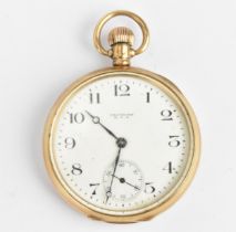 An early 20th century Waltham 9ct gold, open faced pocket watch having a white enamel dial, signed