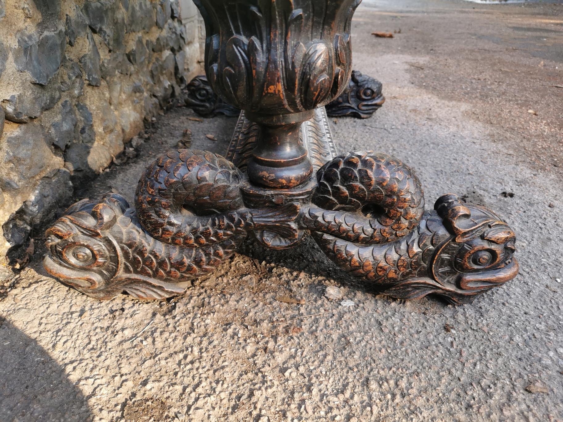 A 19th century Renaissance style carved oak library table, possibly French, with carved dolphin - Image 4 of 7