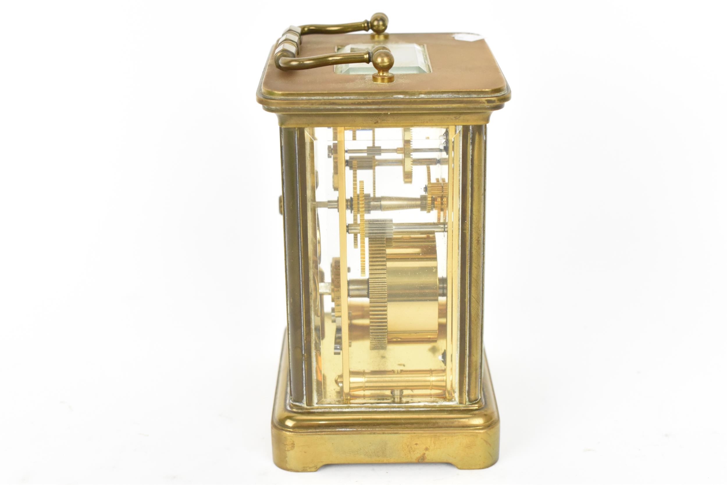 A mid 20th century brass cased carriage clock, white enamel dial with Roman numerals signed - Image 2 of 9