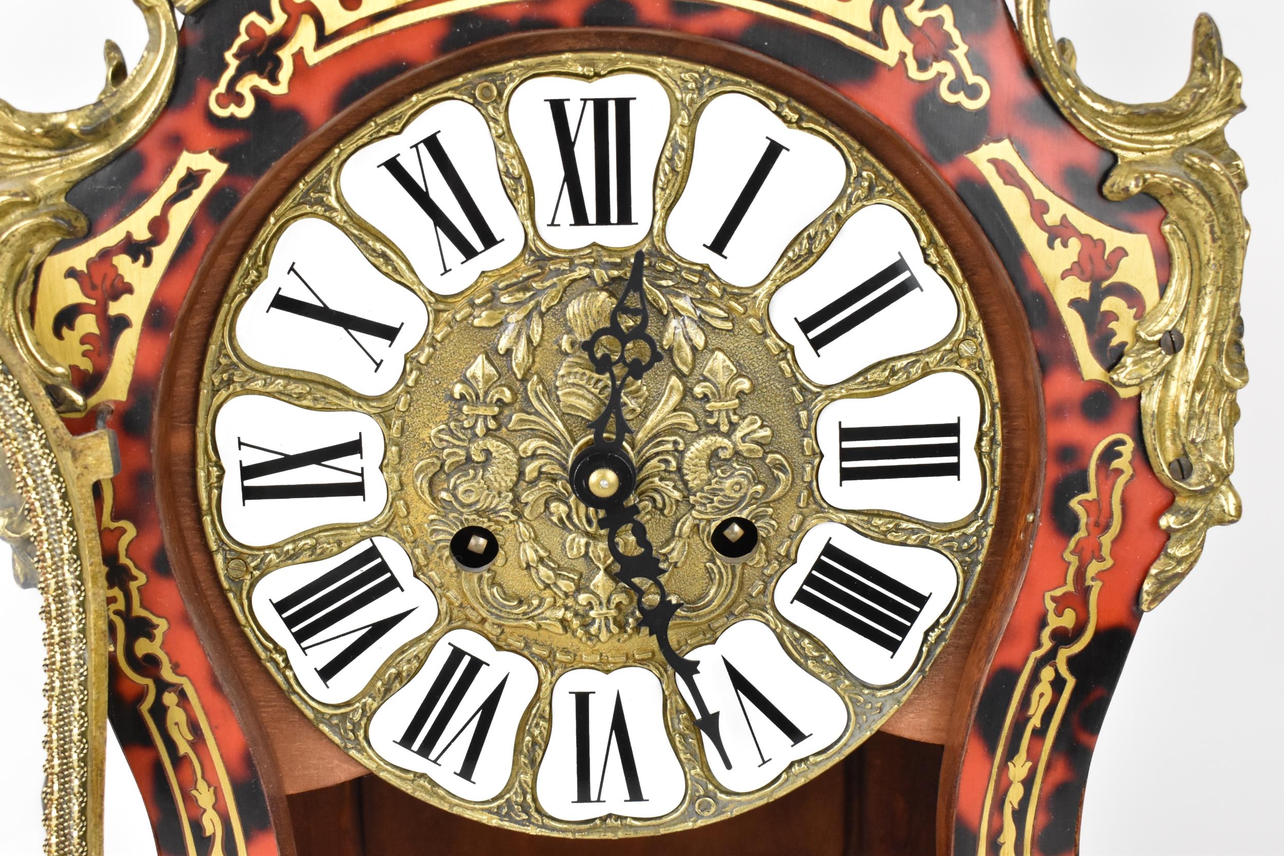 A 20th century French boulle work mantle clock having applied gilt metal C scroll and floral - Image 5 of 10