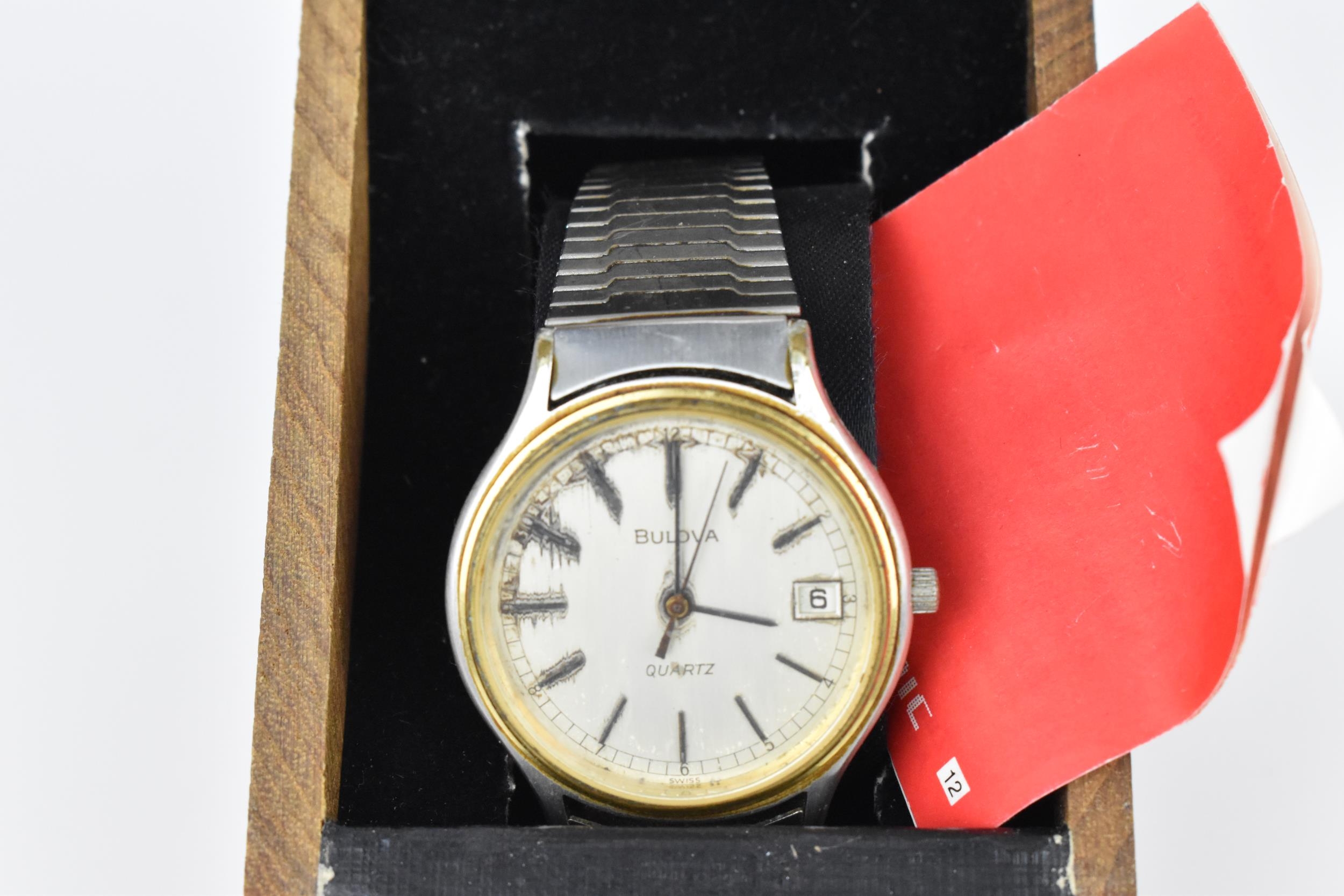 A Bulova quartz, gents stainless steel wristwatch, circa 1979 having a silvered dial with centre - Image 2 of 5