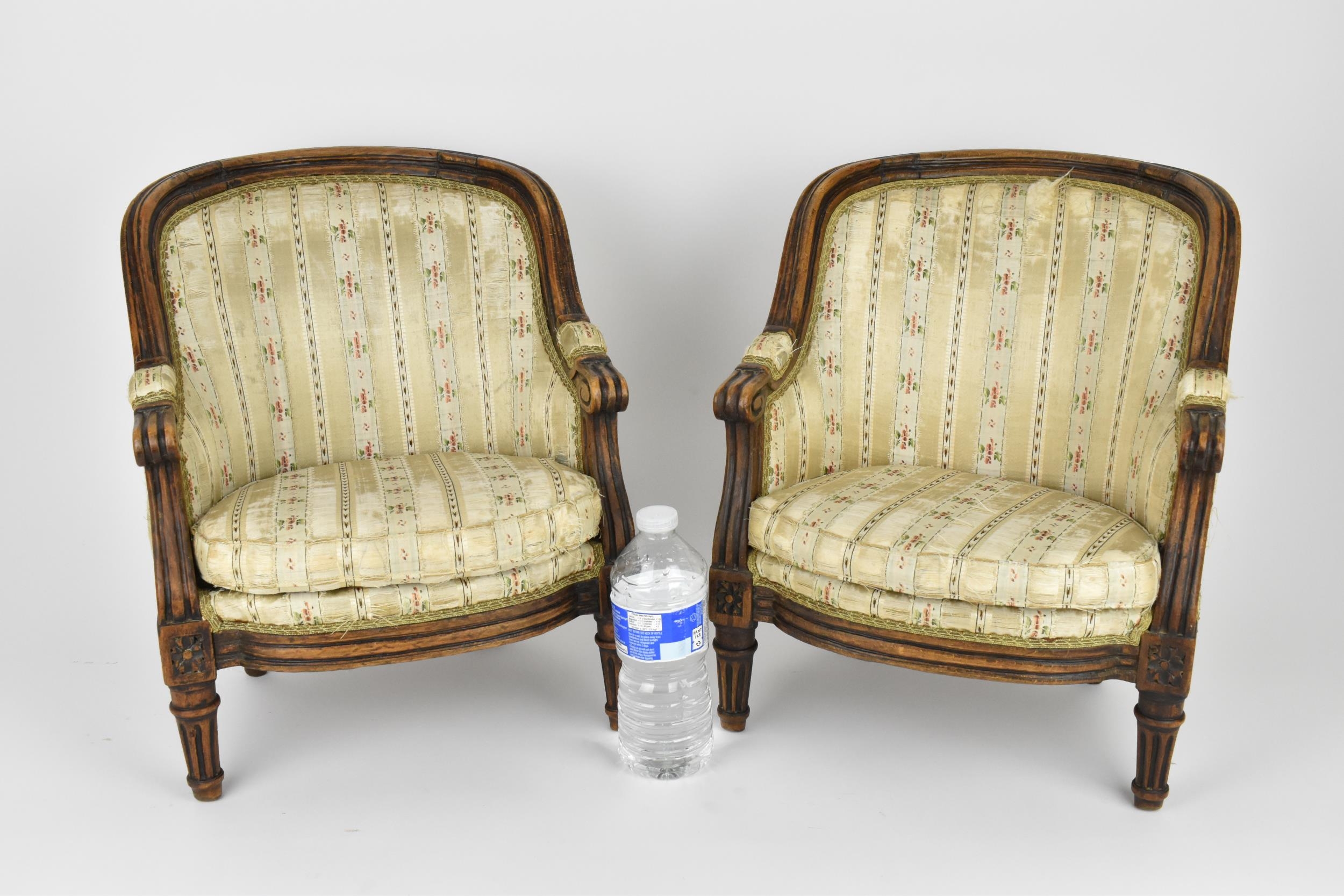 A pair of 18th century French Louis XVI bergère armchairs, circa 1780, with channelled mahogany - Image 2 of 9