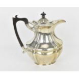 A George V silver coffee pot by Josiah Williams & Co, London 1922, with moulded border, ebony finial