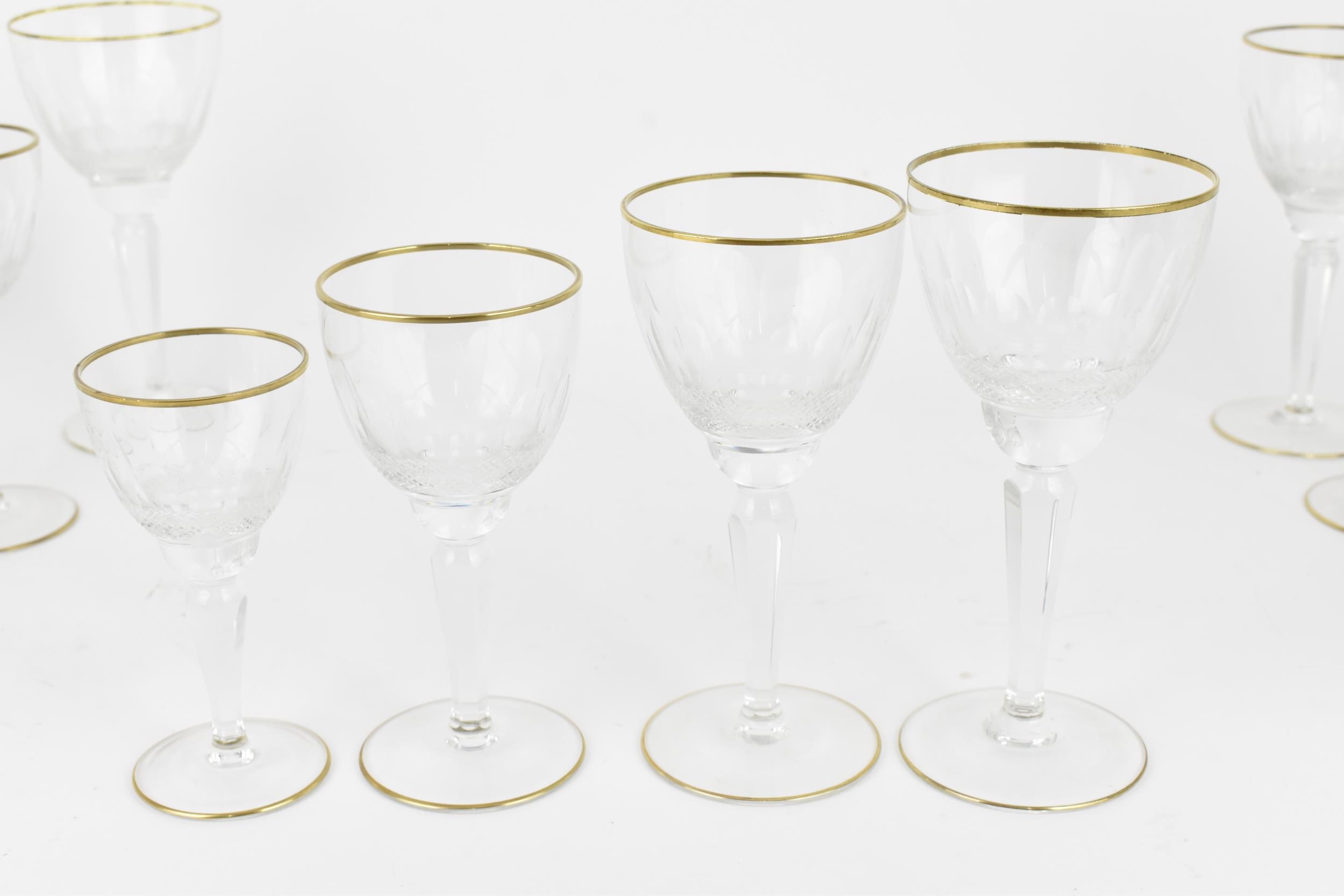 A large suite of cut and gilt-rim footed glasses, possibly French, comprising four nick & nora - Image 6 of 7