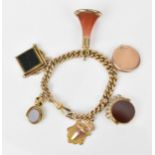 A 9ct yellow gold curb link charm bracelet, with three bloodstone mounted swivel fobs, an agate