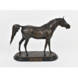A patinated bronze model of an Arab stallion, with tasselled bridle, signed and dated to the base '