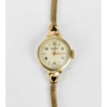 A Vertex manual wind, ladies 9ct gold wristwatch having a white dial with Arabic numerals, 9ct