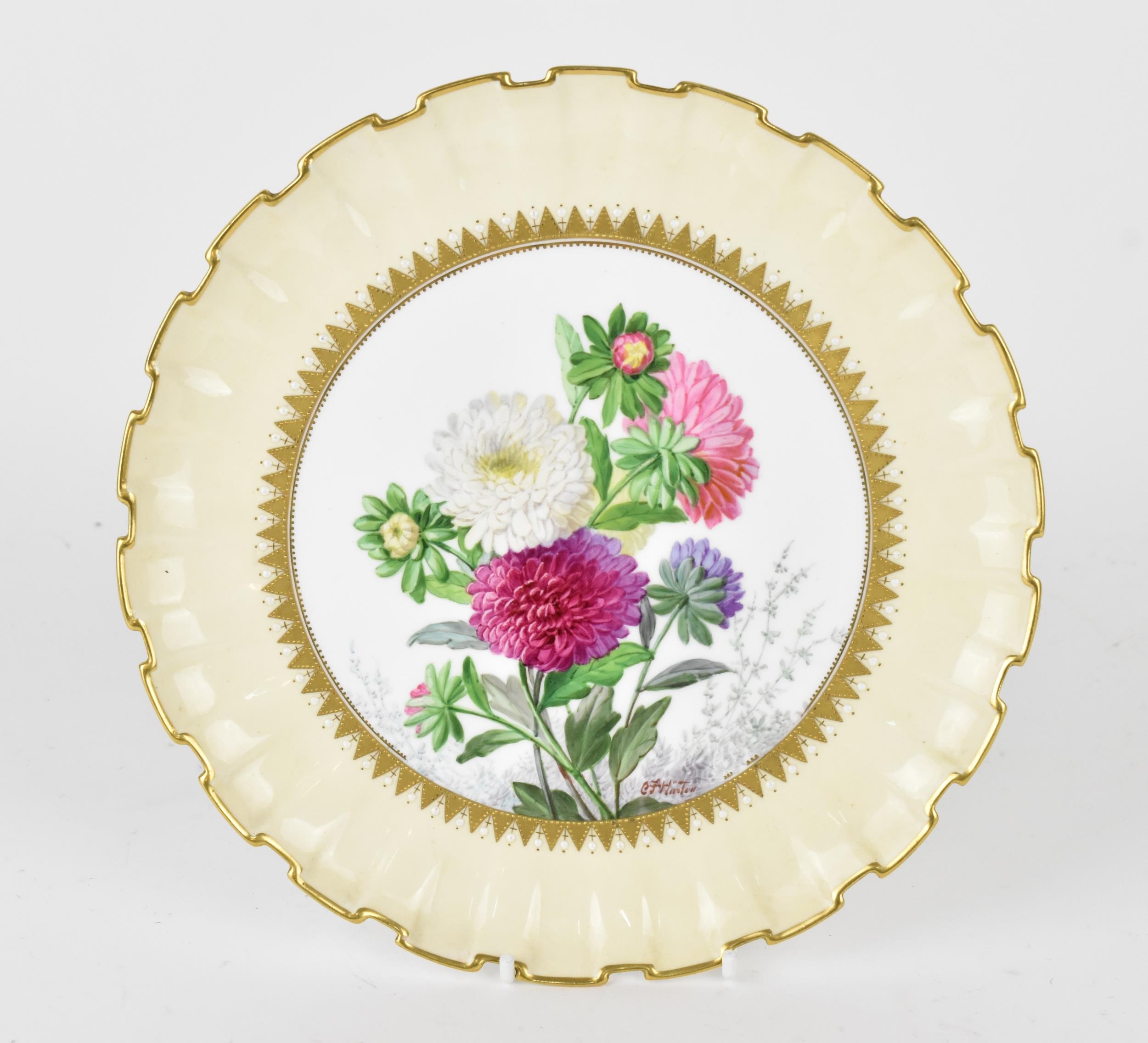 A 19th century Copeland china cabinet plate, hand painted by CF Hurten, with central chrysanthemum