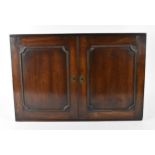 A George III mahogany drapers cabinet, of travelling format with swan neck handles either side,