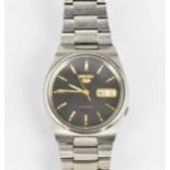 A Seiko 5 automatic, gents stainless steel wristwatch, having a black dial with centre seconds,